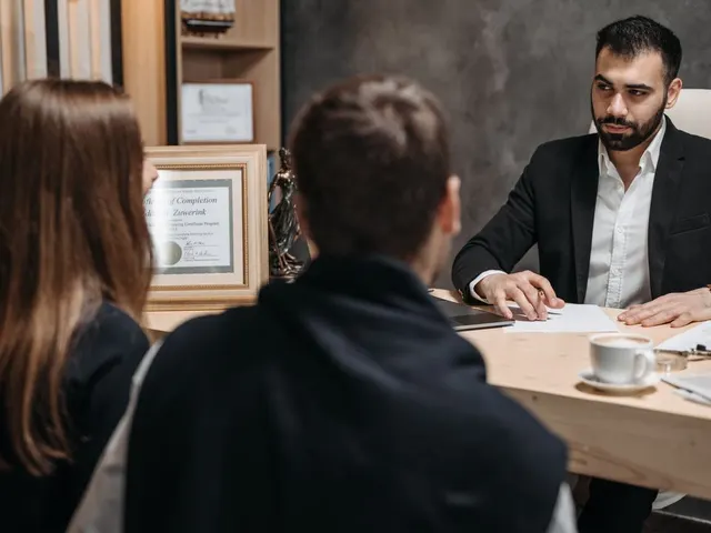 Lawyer meeting with clients in an office